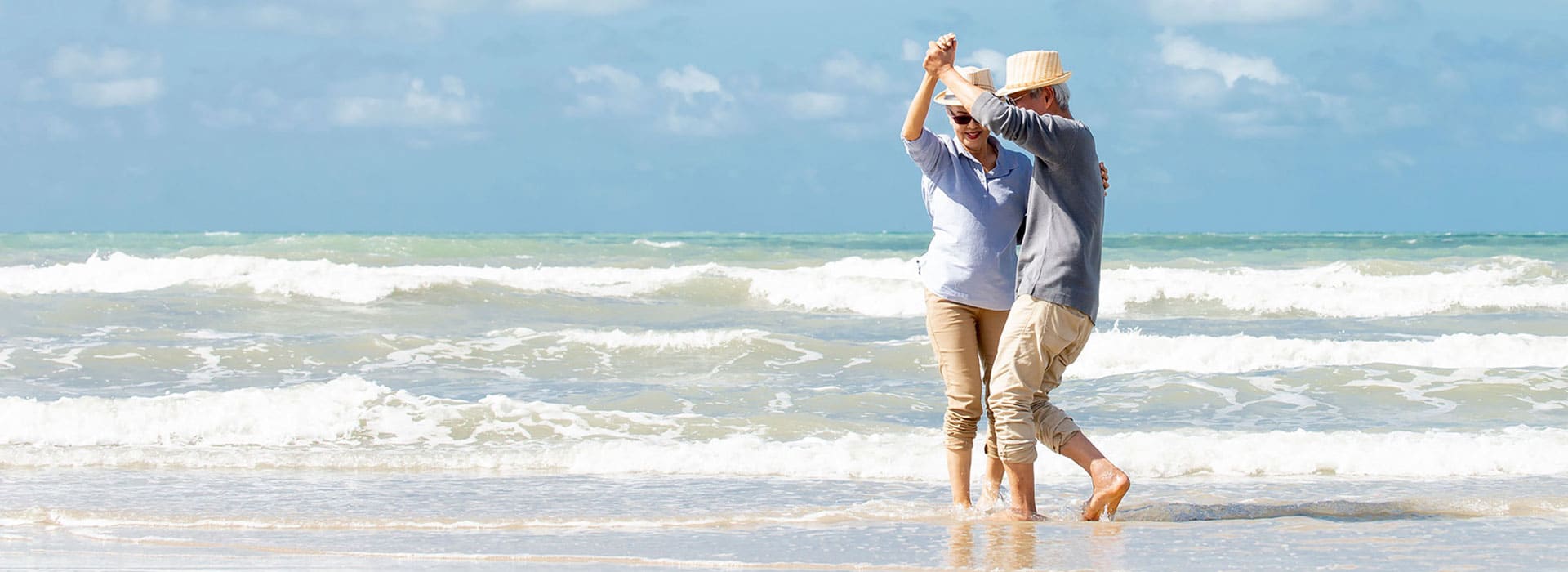 Senior Couple Dancing on the beach