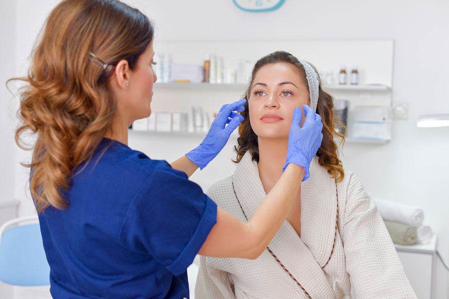 Woman Receiving Skin Care Treatment