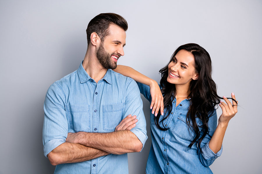 Man and Woman Smiling at each other