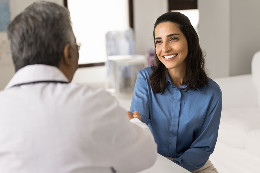 Doctor patient smiling