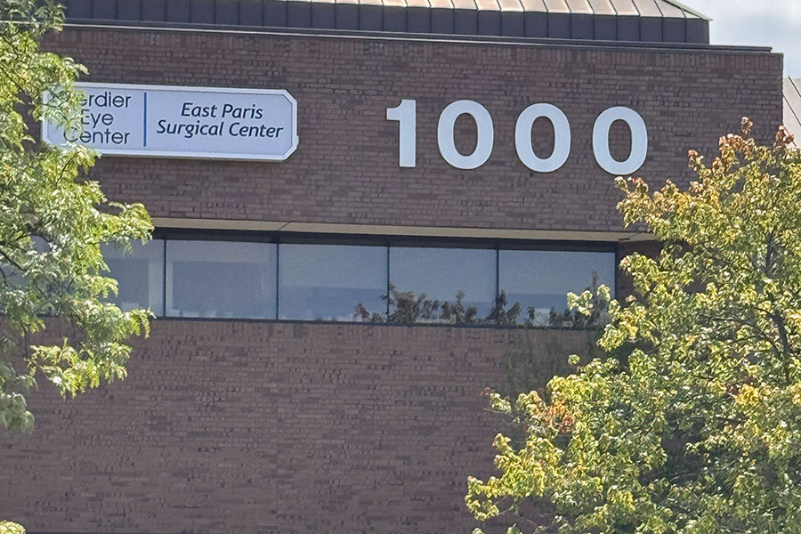 Brick building at 1000 with signage for Verdier Eye Center and East Paris Surgical Center, an office space in Grand Rapids.