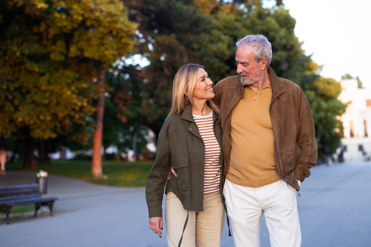 Couple strolling through an autumn park