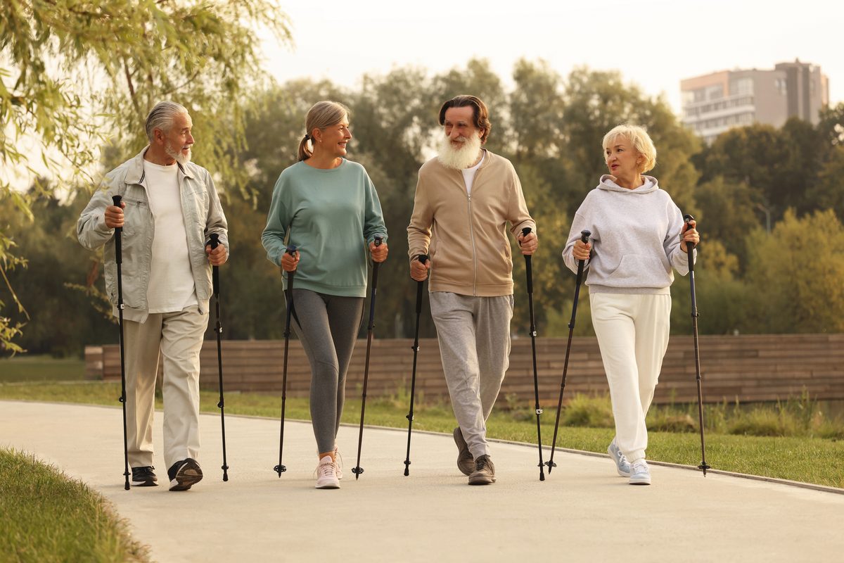 Seniors Nordic walking in the park
